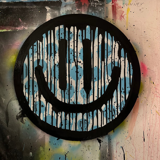 Drippy smiley on blue polkadots with black splatter on Maplewood cut out