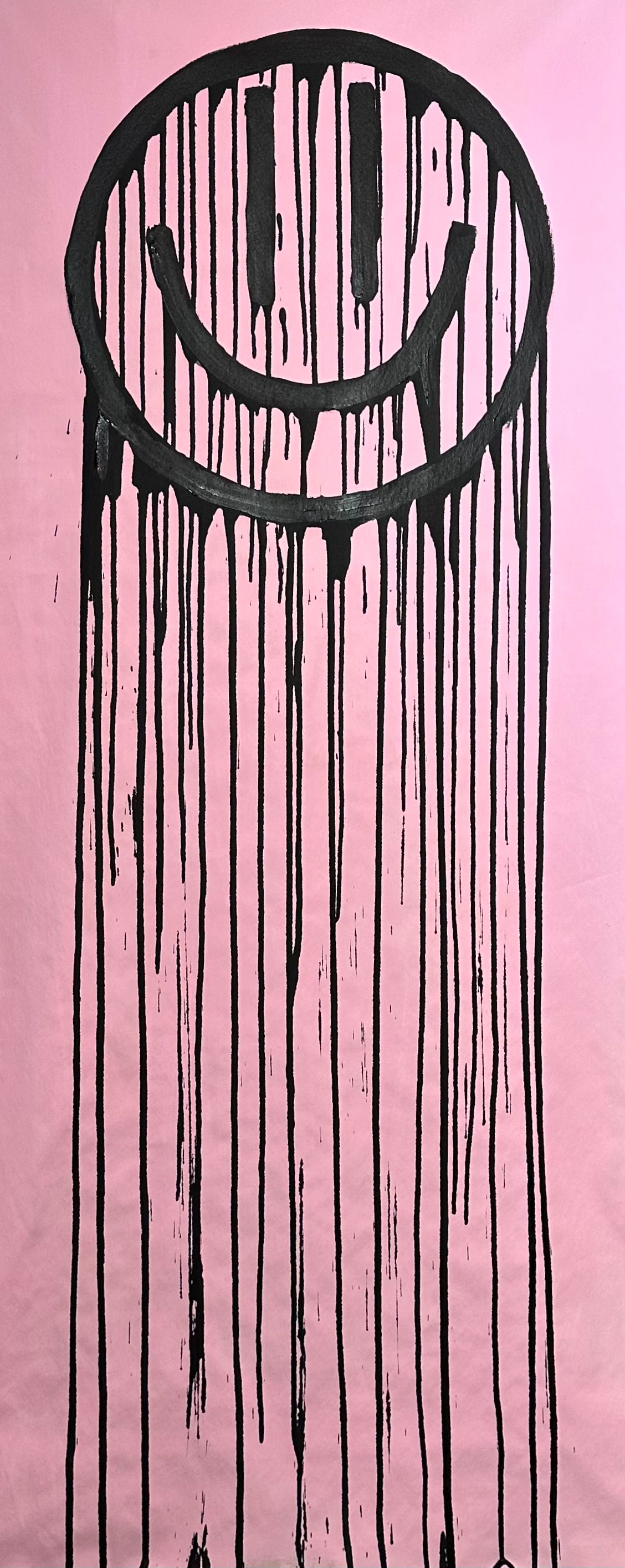 Long, black trippy smiley on pink