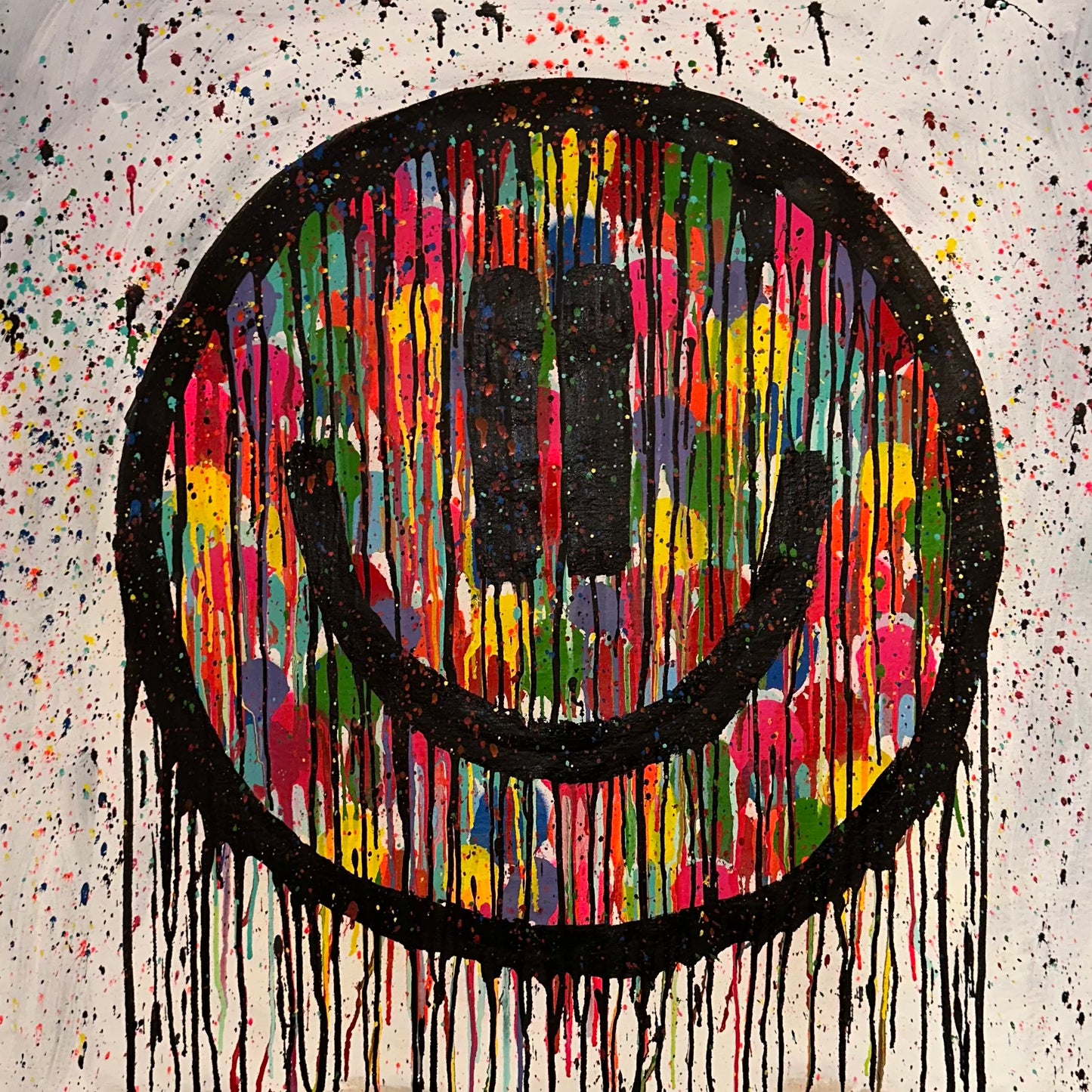 Colorful drippy smiley with splatter