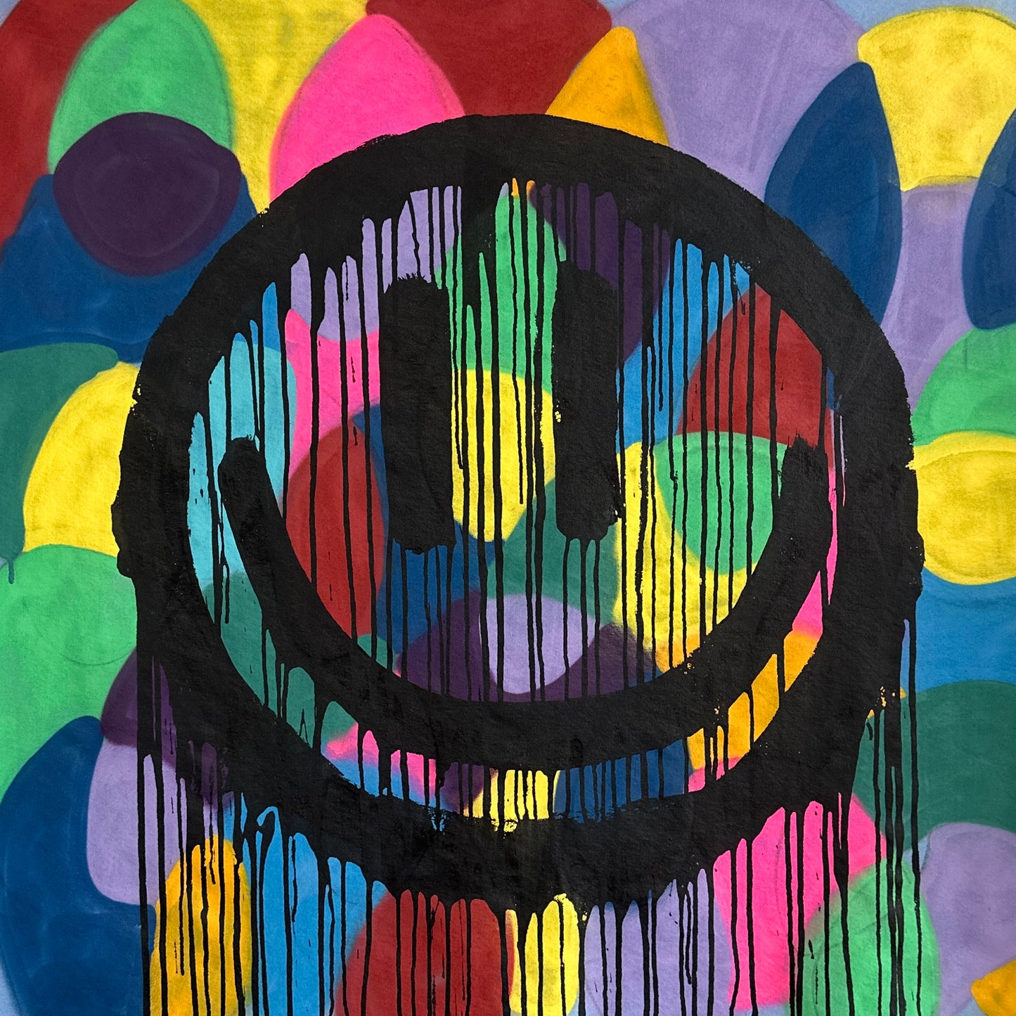 Drippy smiley on light purple with color