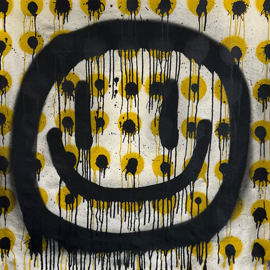 Drippy smiley on Black and yellow polkadots