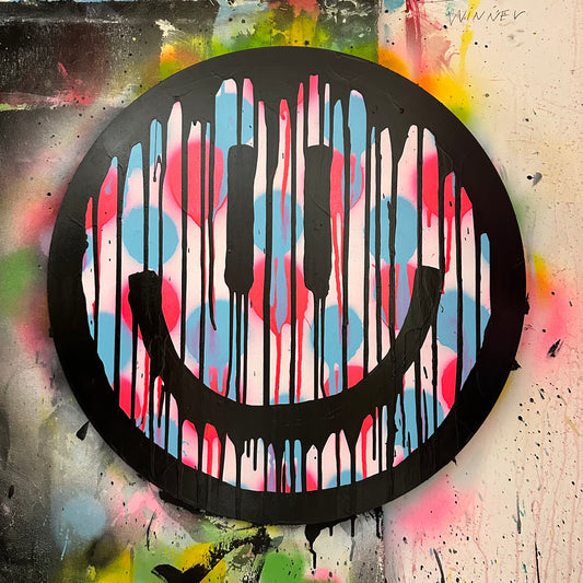 Drippy smiley on blue and pink polkadots on Maplewood cut out